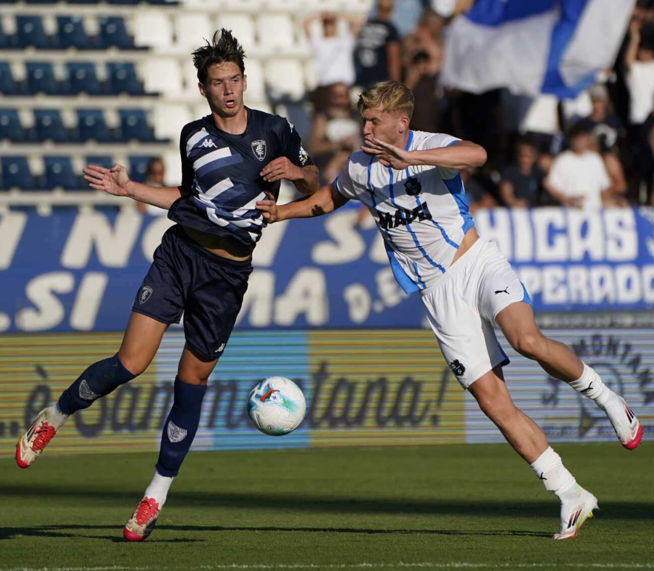 Empoli™s Bohdan Popov fight for the ball with Sassuolo™s Tarik Muharemovic during the friendly soccer match between Empoli and Sassuolo at the Carlo Castellani - Computer Gross Arena Stadium in Empoli (FI), center of Italy - Tuesday , August 05, 2025. - Soccer PUBLICATIONxNOTxINxITAxFRAxCHN Copyright: xMarcoxBucco LaxPressex